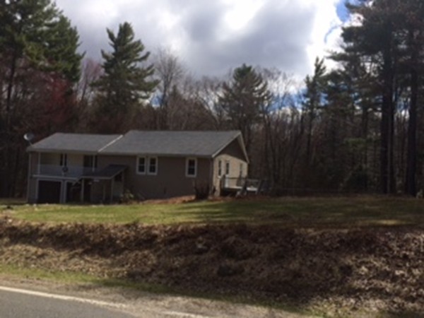 17 Searle Road Huntington, MA 01050 - Photo 4 of 19 a house that has a tree in it