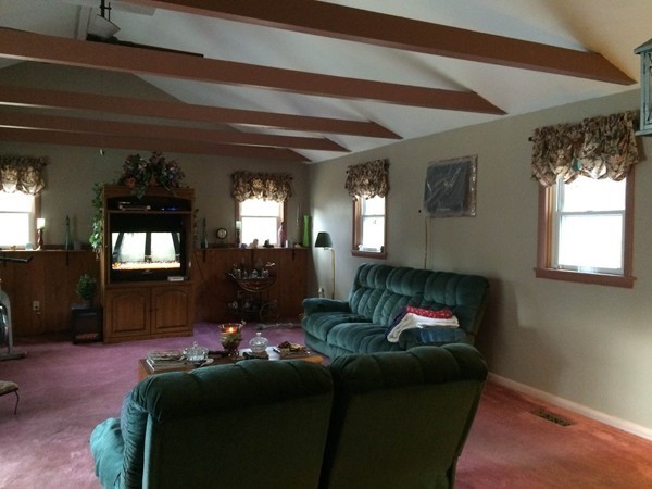 17 Searle Road Huntington, MA 01050 - Photo 5 of 19 a living room with furniture and a fireplace