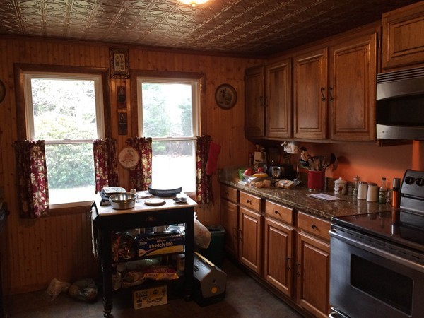 17 Searle Road Huntington, MA 01050 - Photo 7 of 19 a kitchen with stainless steel appliances granite countertop a stove a sink dishwasher and cabinets with wooden floor