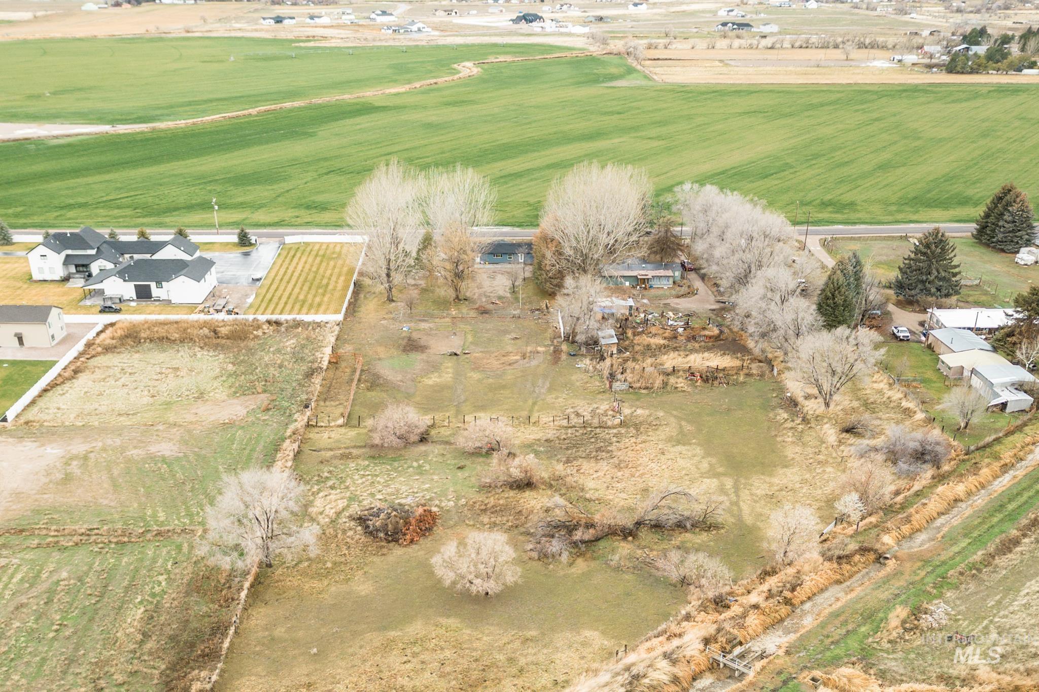 13678 North Hawthorne Road Pocatello, ID 83202 - Photo 37 of 37 Aerial view of property and surrounding area with rural landscape