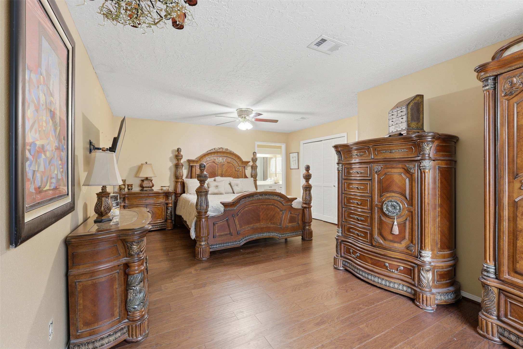 7010 River Mill Drive Spring, TX 77379 - Photo 19 of 29 a bedroom with furniture and a window