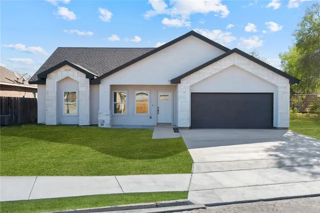 a front view of house with yard