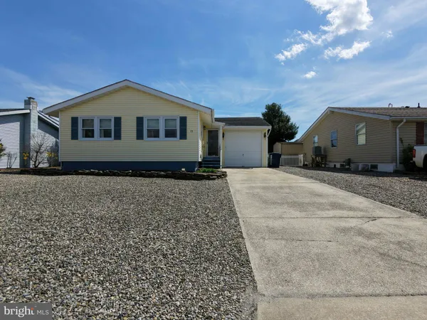 a house with trees in the background