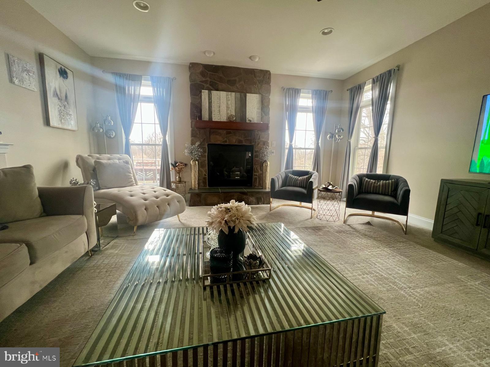 101 Richards Way Avondale, PA 19311 - Photo 19 of 45 a living room with furniture and a fireplace
