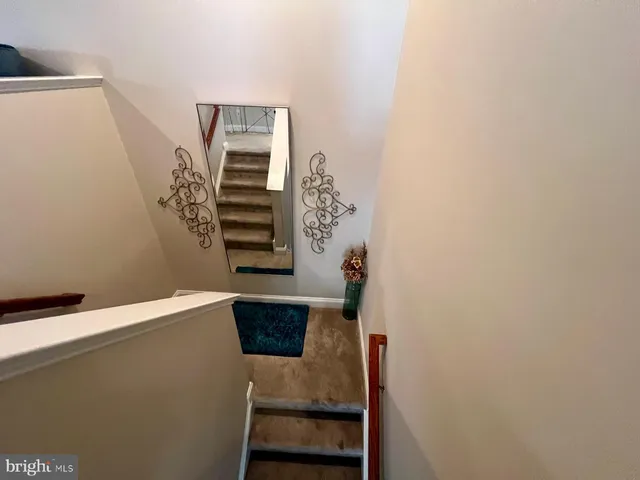 a view of entryway with stairs