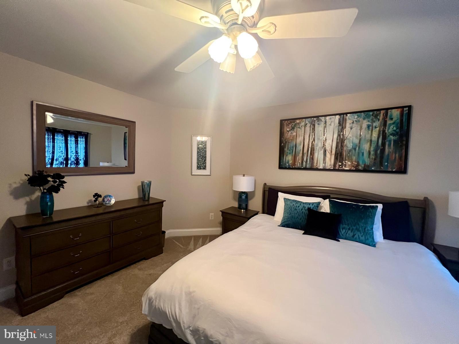 101 Richards Way Avondale, PA 19311 - Photo 35 of 45 a bedroom with a bed and a dresser