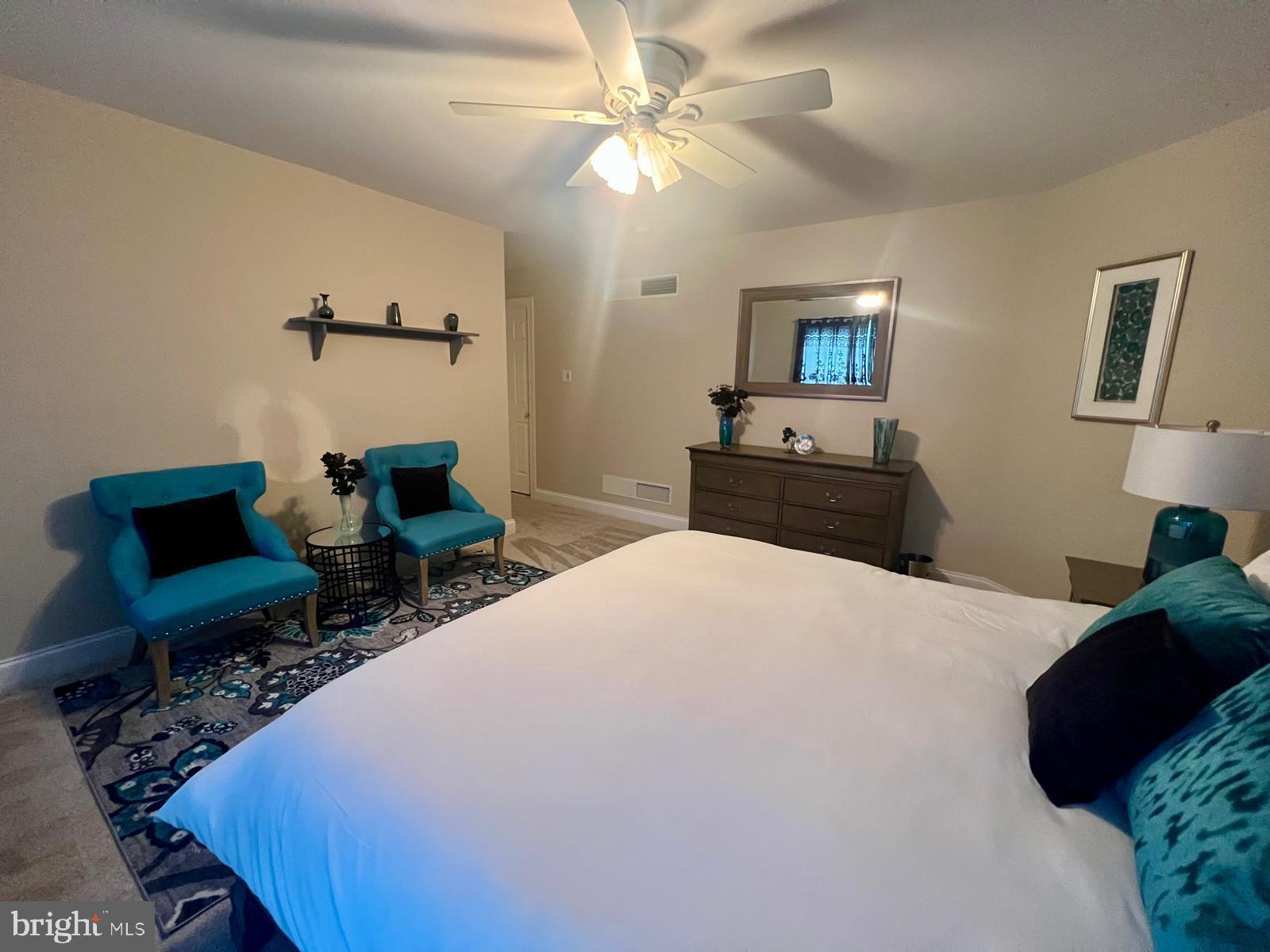 101 Richards Way Avondale, PA 19311 - Photo 36 of 45 a bedroom with a bed and a chair