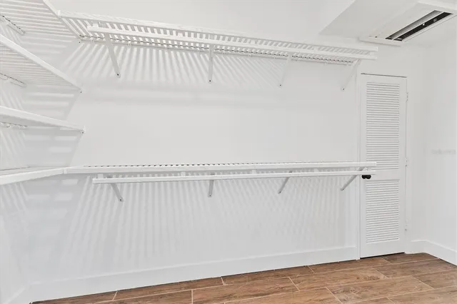 a view of an empty walk in closet