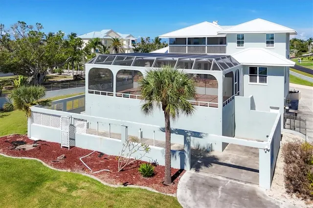 a view of a swimming pool with an outdoor space and seating area
