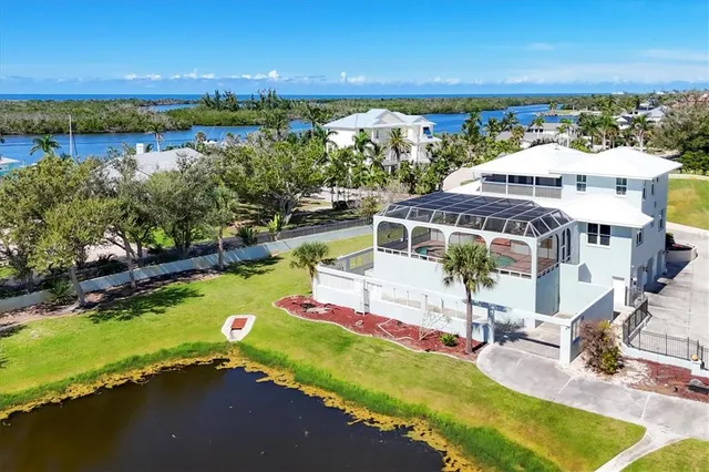 a view of a swimming pool with an outdoor space and seating area