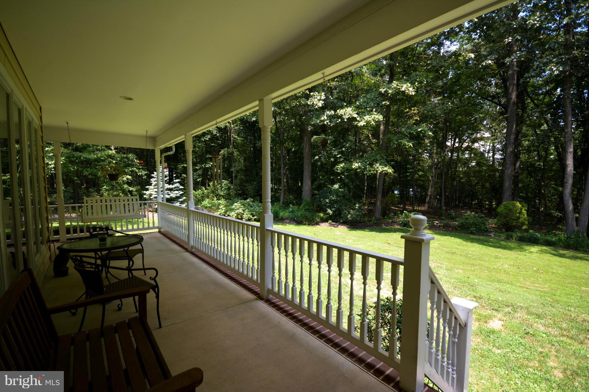 21127 Gunpowder Road Manchester, MD 21102 - Photo 12 of 30 Wraparound Porch to Enjoy Tranquil Setting