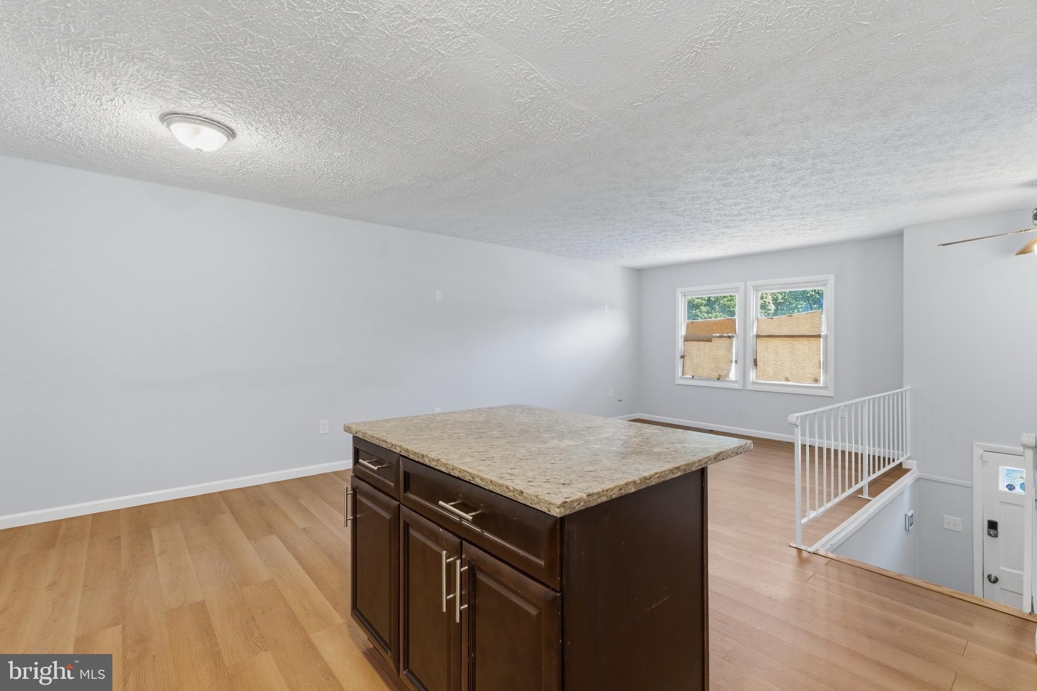 119 Jefferson Road Waldorf, MD 20602 - Photo 10 of 40 a view of kitchen island with wooden floor