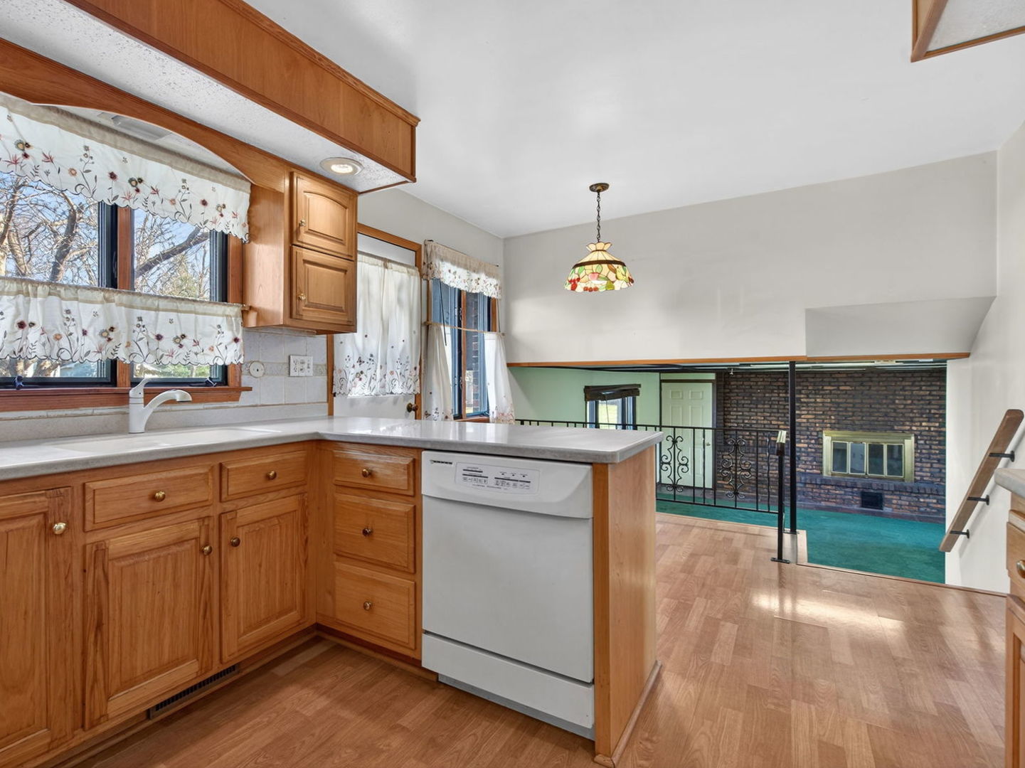 185 North Dewey Street Diamond, IL 60416 - Photo 14 of 39 a kitchen with a sink cabinets and wooden floor