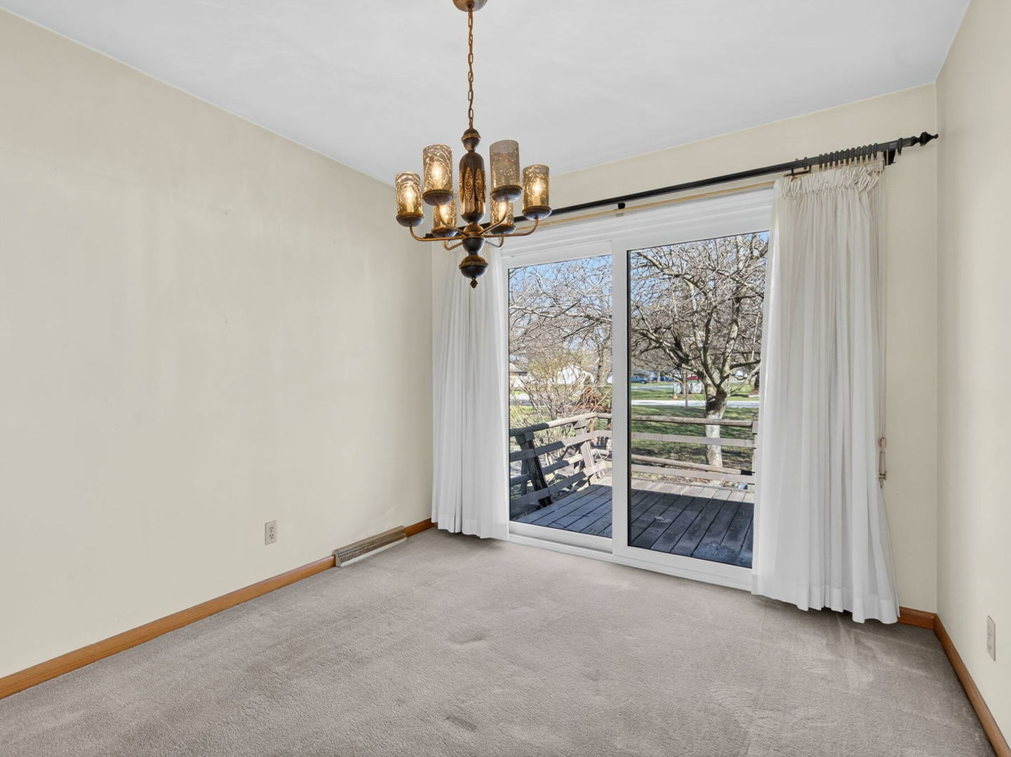 185 North Dewey Street Diamond, IL 60416 - Photo 8 of 39 a view of an empty room with a window