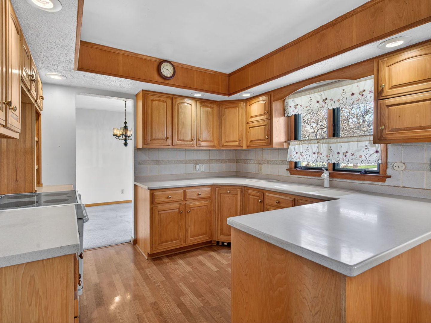185 North Dewey Street Diamond, IL 60416 - Photo 10 of 39 a kitchen with stainless steel appliances granite countertop a sink and a stove