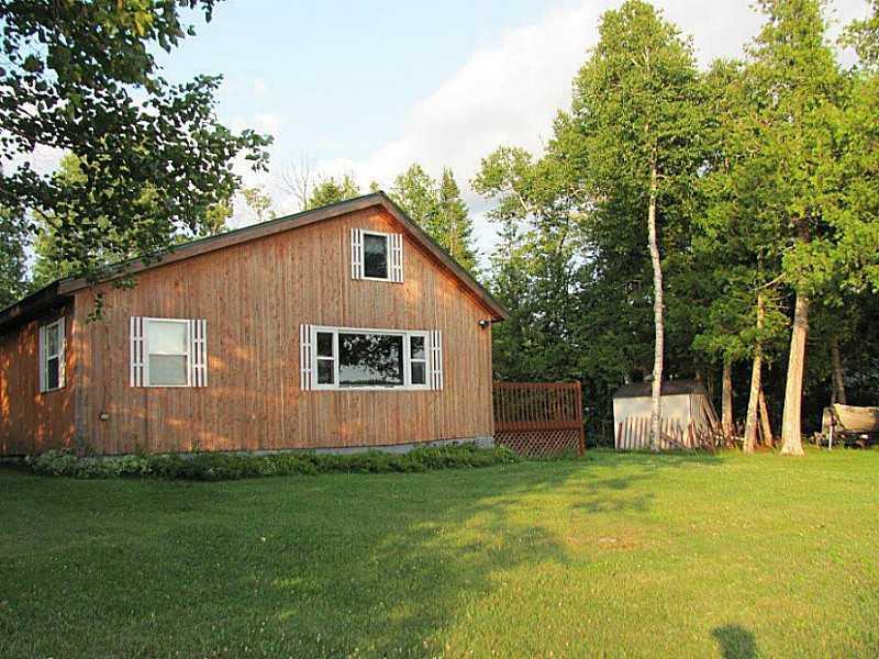 323 East Cottage Road Portage Lake, ME 04768 - Photo 5 of 20 Exterior Side View.