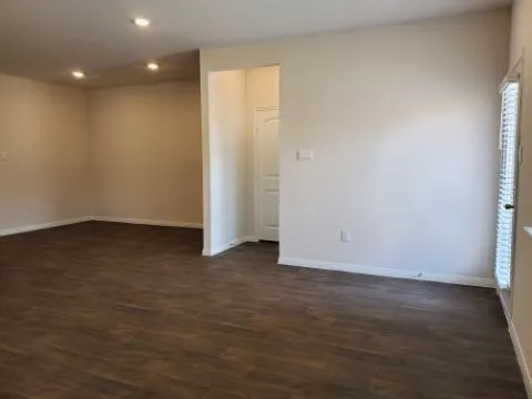 a kitchen with a sink and stainless steel appliances