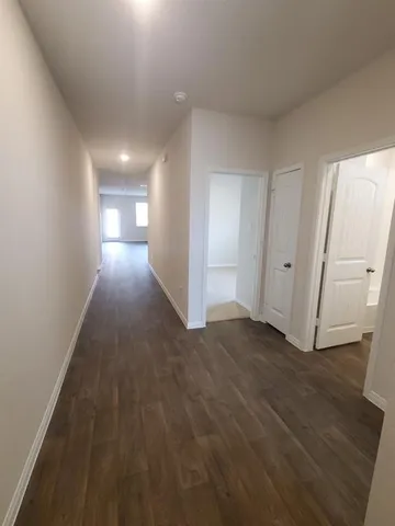 a view of a room with an empty space