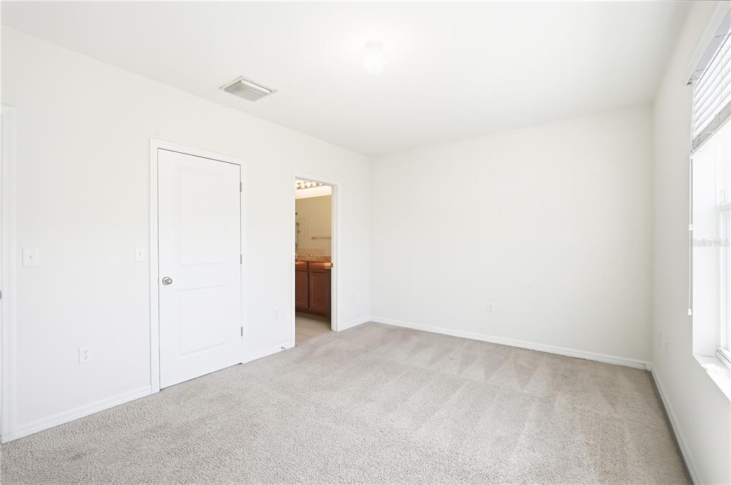 8986 Indigo Trail Loop Riverview, FL 33578 - Photo 15 of 28 a view of an empty room