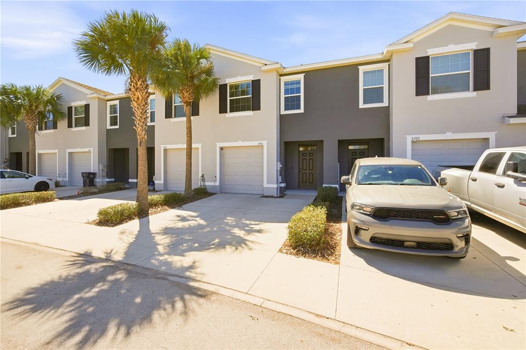8986 Indigo Trail Loop Riverview, FL 33578 - Photo 2 of 28 a car parked in front of a house