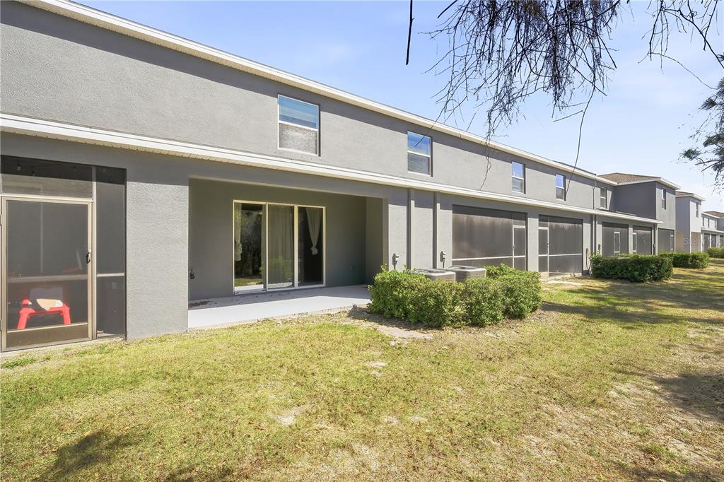 8986 Indigo Trail Loop Riverview, FL 33578 - Photo 23 of 28 a view of a house with a swimming pool