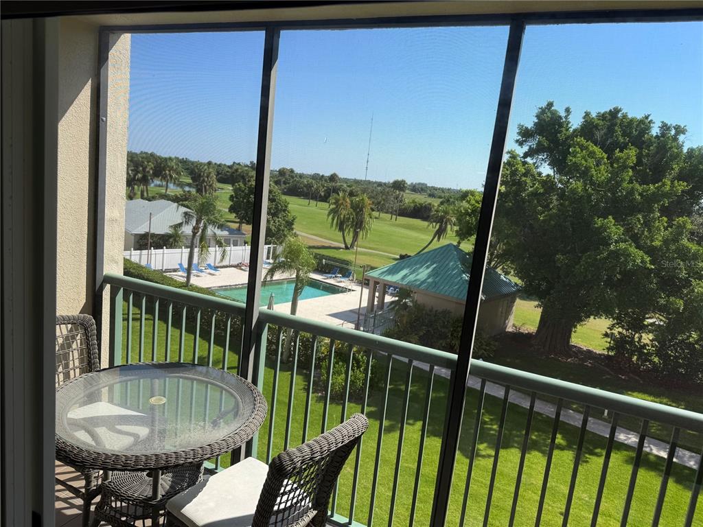 2320 Terra Ceia Bay Boulevard, Unit 404 Palmetto, FL 34221 - Photo 5 of 12 a view of a balcony with chair