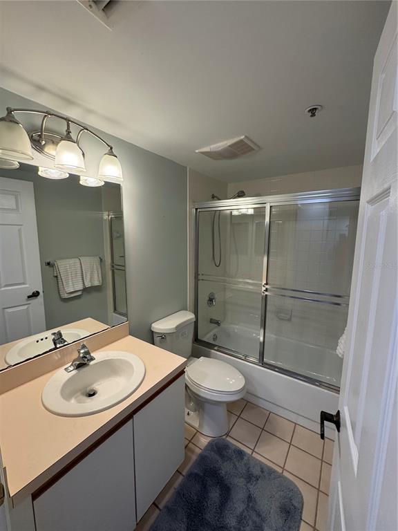 2320 Terra Ceia Bay Boulevard, Unit 404 Palmetto, FL 34221 - Photo 10 of 12 a bathroom with a sink toilet and shower