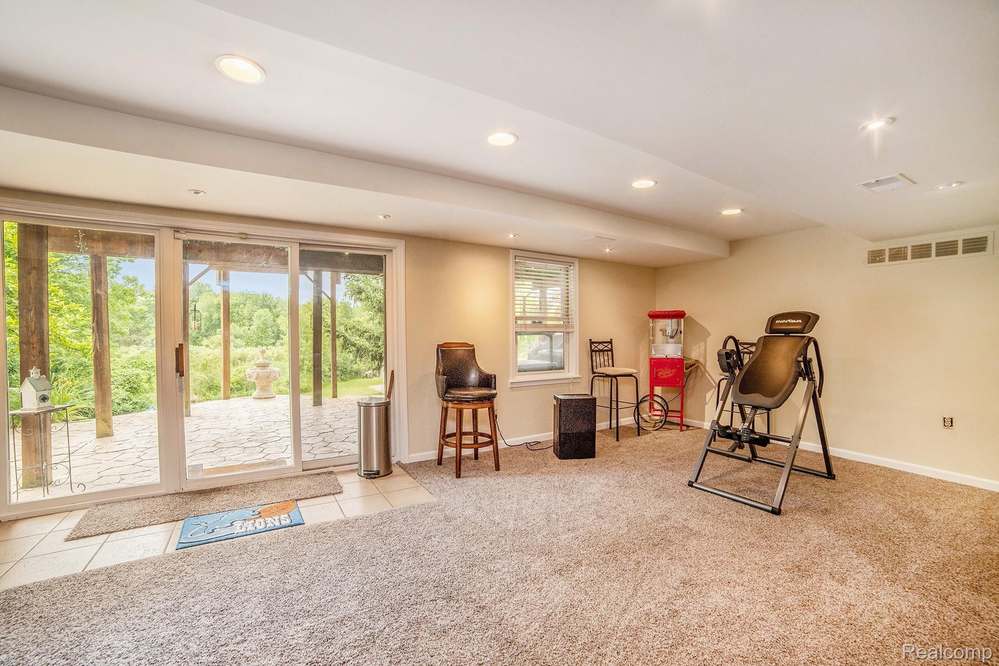 2030 34 Mile Road Romeo, MI 48065 - Photo 23 of 44 Walk out has new carpet.jpg