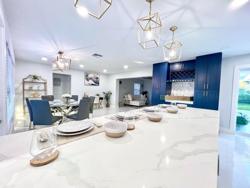 324 Bamboo Road Palm Beach Shores, FL 33404 - Photo 19 of 59 Kitchen and Dining Area