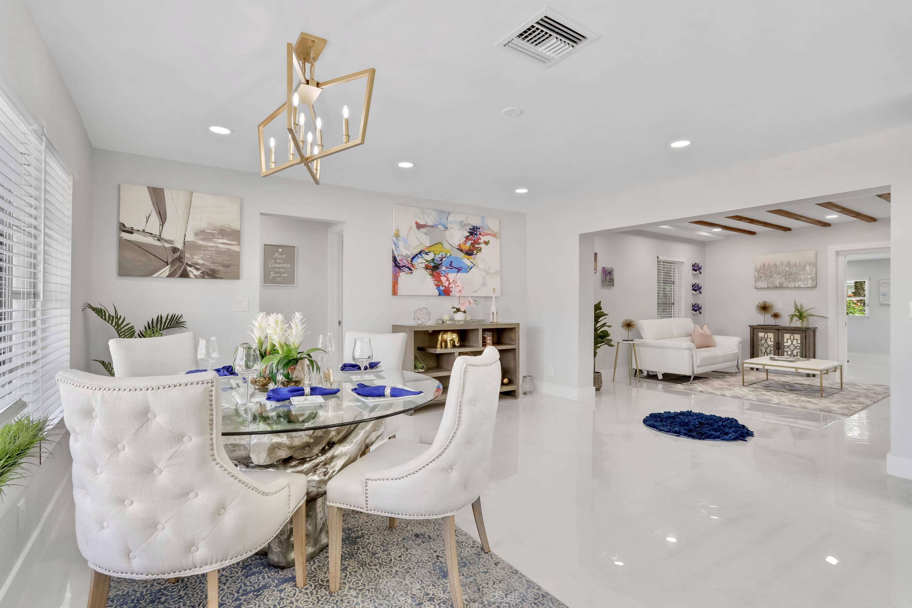 324 Bamboo Road Palm Beach Shores, FL 33404 - Photo 40 of 59 a living room with furniture and kitchen view