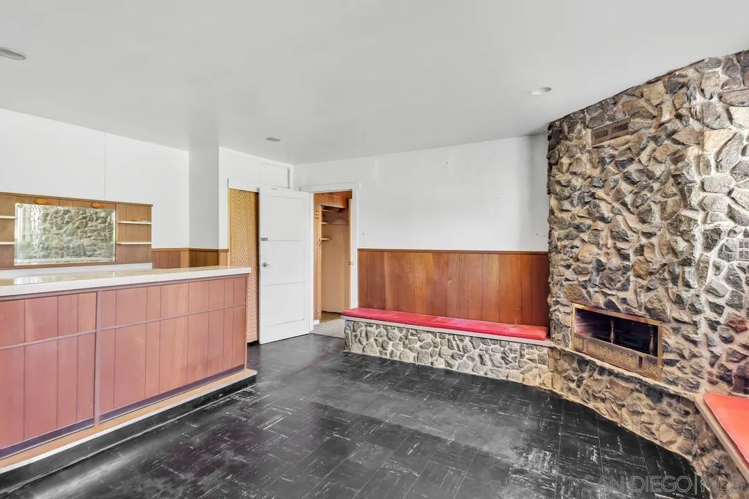 9517 Abbeyfield Road Santee, CA 92071 - Photo 13 of 42 a room with painting on the wall and a shower