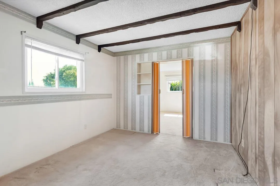 9517 Abbeyfield Road Santee, CA 92071 - Photo 19 of 42 an empty room with windows