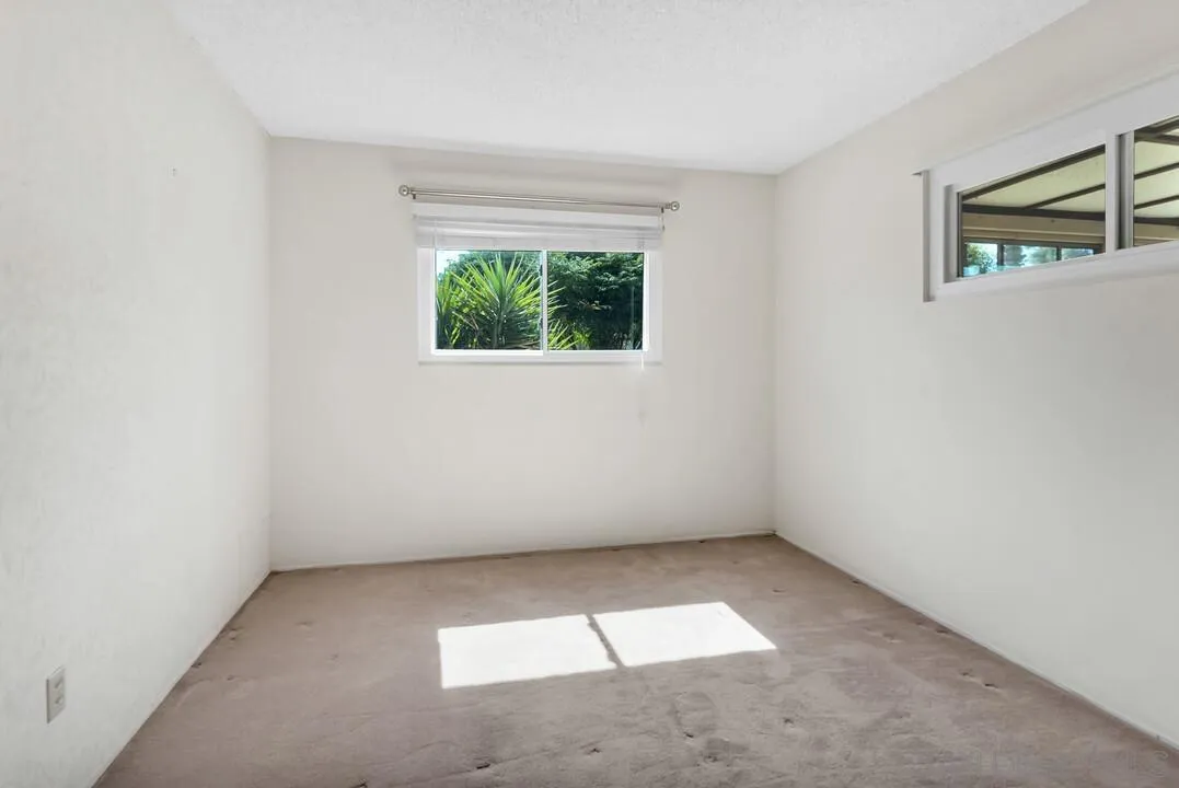 9517 Abbeyfield Road Santee, CA 92071 - Photo 21 of 42 an empty room with a window