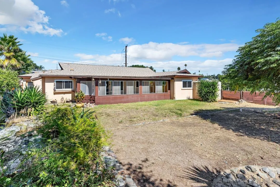 9517 Abbeyfield Road Santee, CA 92071 - Photo 31 of 42 front view of a house with a yard