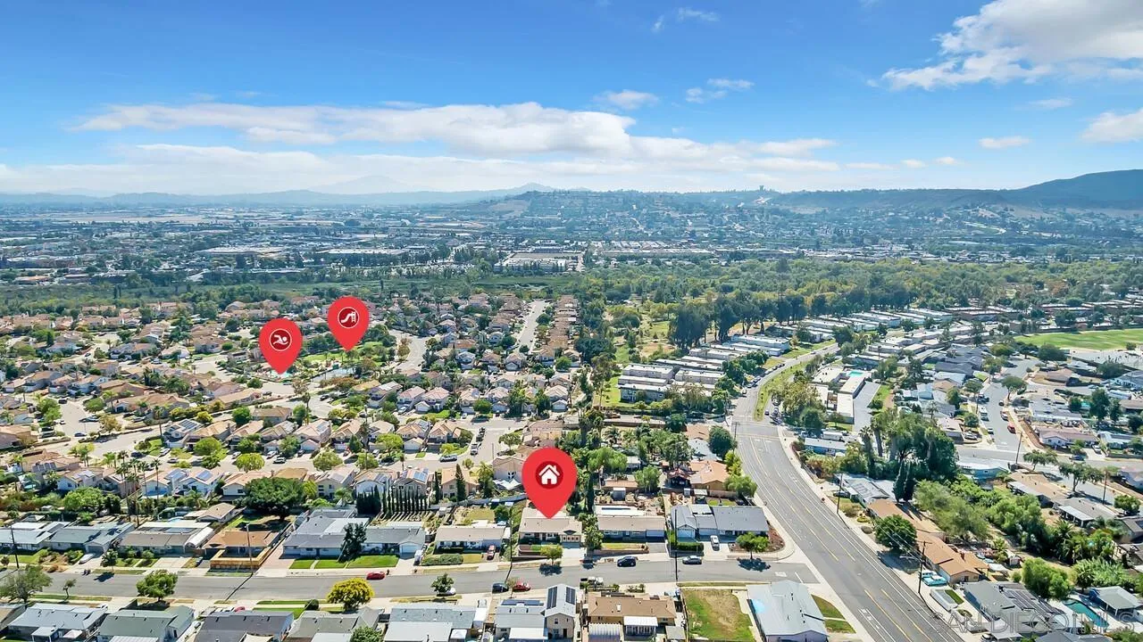 9517 Abbeyfield Road Santee, CA 92071 - Photo 35 of 42 an aerial view of residential houses with outdoor space