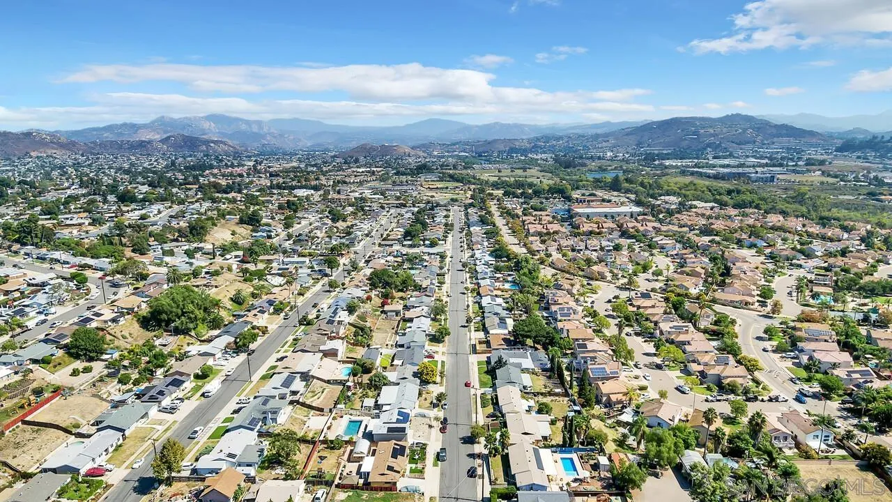 9517 Abbeyfield Road Santee, CA 92071 - Photo 41 of 42 an aerial view of residential houses with outdoor space and trees