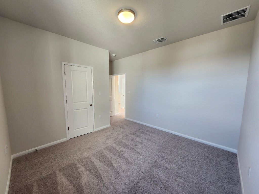 320 Creek Road, Unit 202 Dripping Springs, TX 78620 - Photo 23 of 26 a view of an empty room