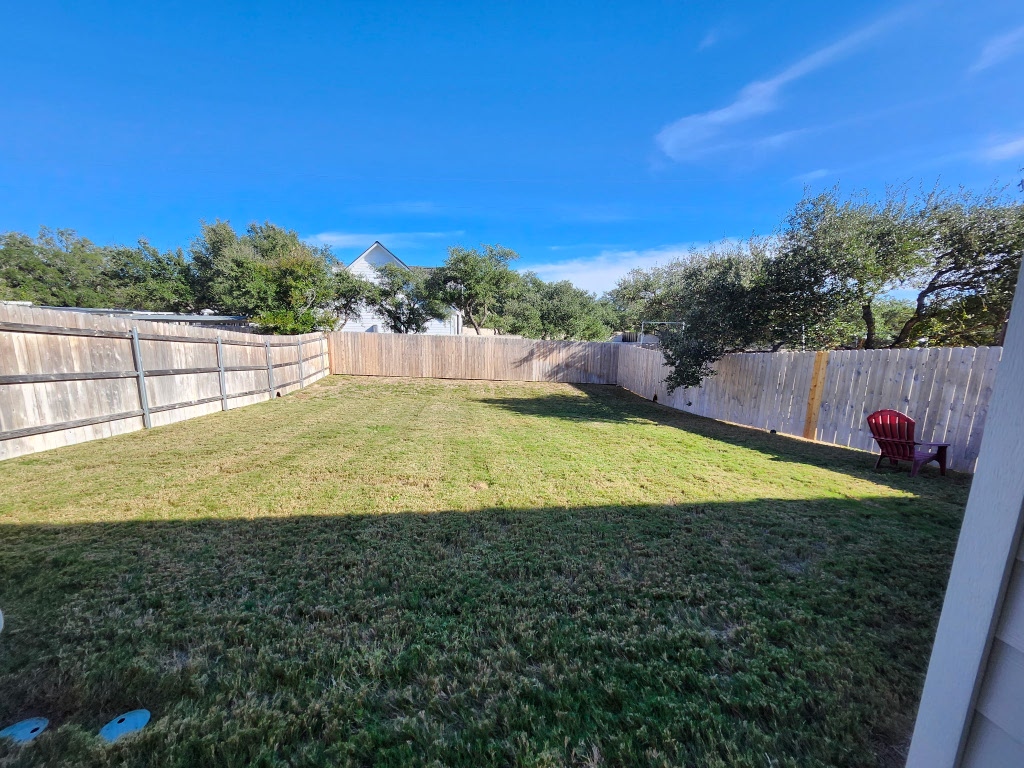 320 Creek Road, Unit 202 Dripping Springs, TX 78620 - Photo 26 of 26 a view of a swimming pool with an outdoor space and seating area
