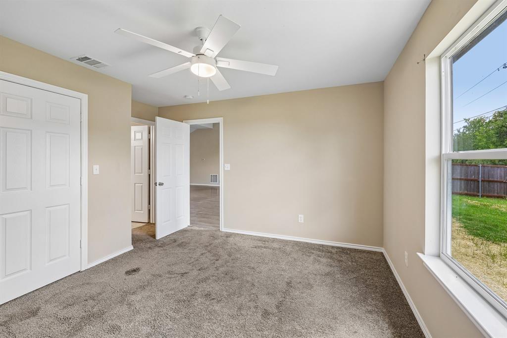 433 Whitney Court Rio Vista, TX 76093 - Photo 19 of 27 a view of an empty room with a window