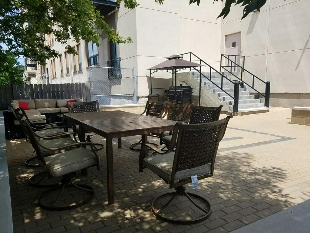 2451 West Howard Street, Unit 401 Chicago, IL 60645 - Photo 13 of 14 a view of a house with backyard and sitting area