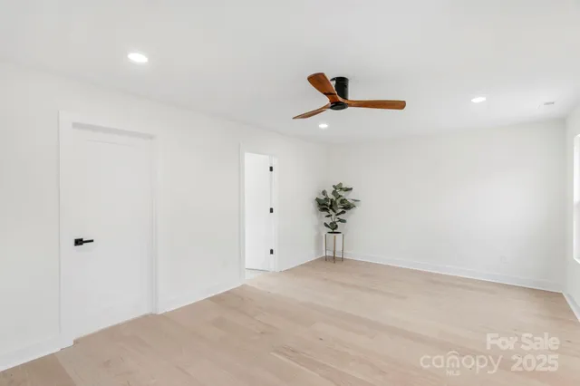 a view of a room with a sink and a toilet