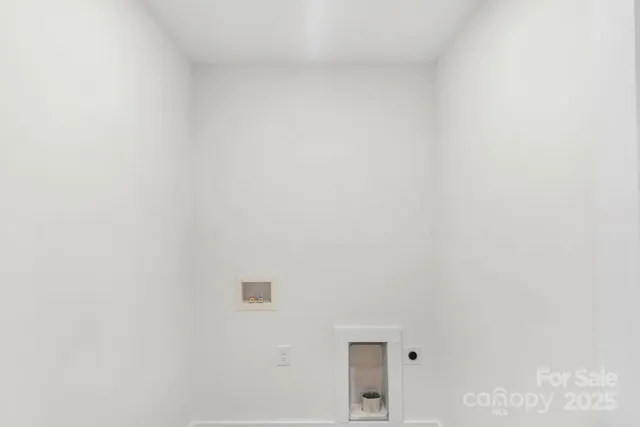 a view of a hallway with closet area