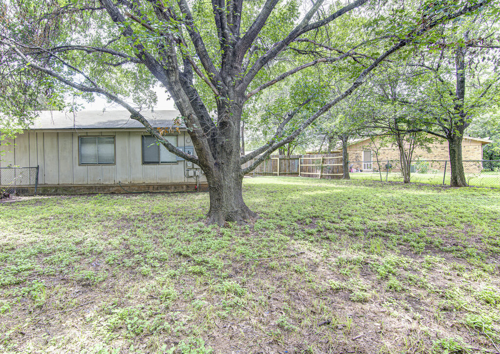 5301 Indio Circle, Unit A Austin, TX 78745 - Photo 21 of 25 Mature trees define the borders of this ample, verdant yard.