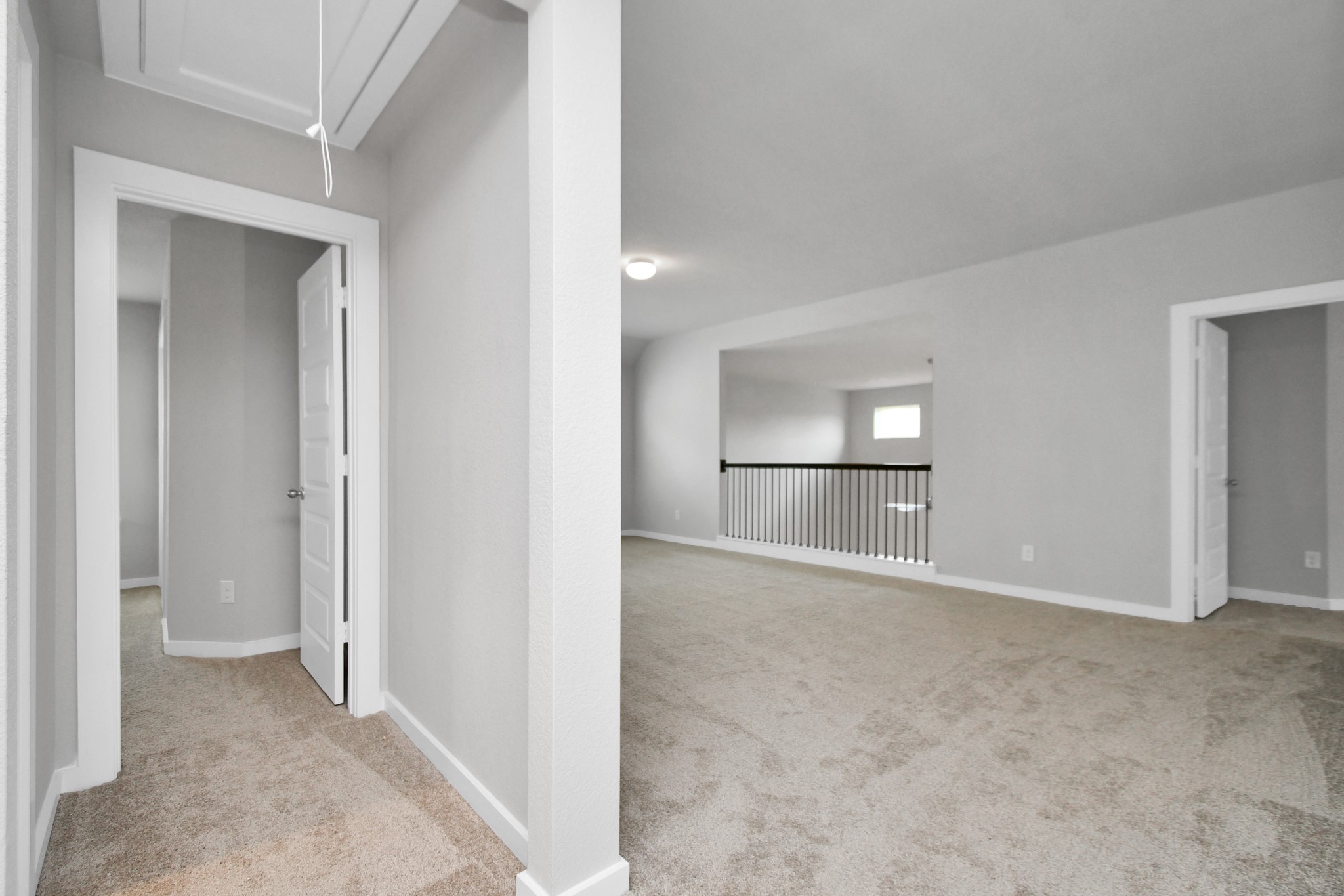 15111 Statice Trail Houston, TX 77044 - Photo 24 of 35 an empty room with fireplace and chandelier