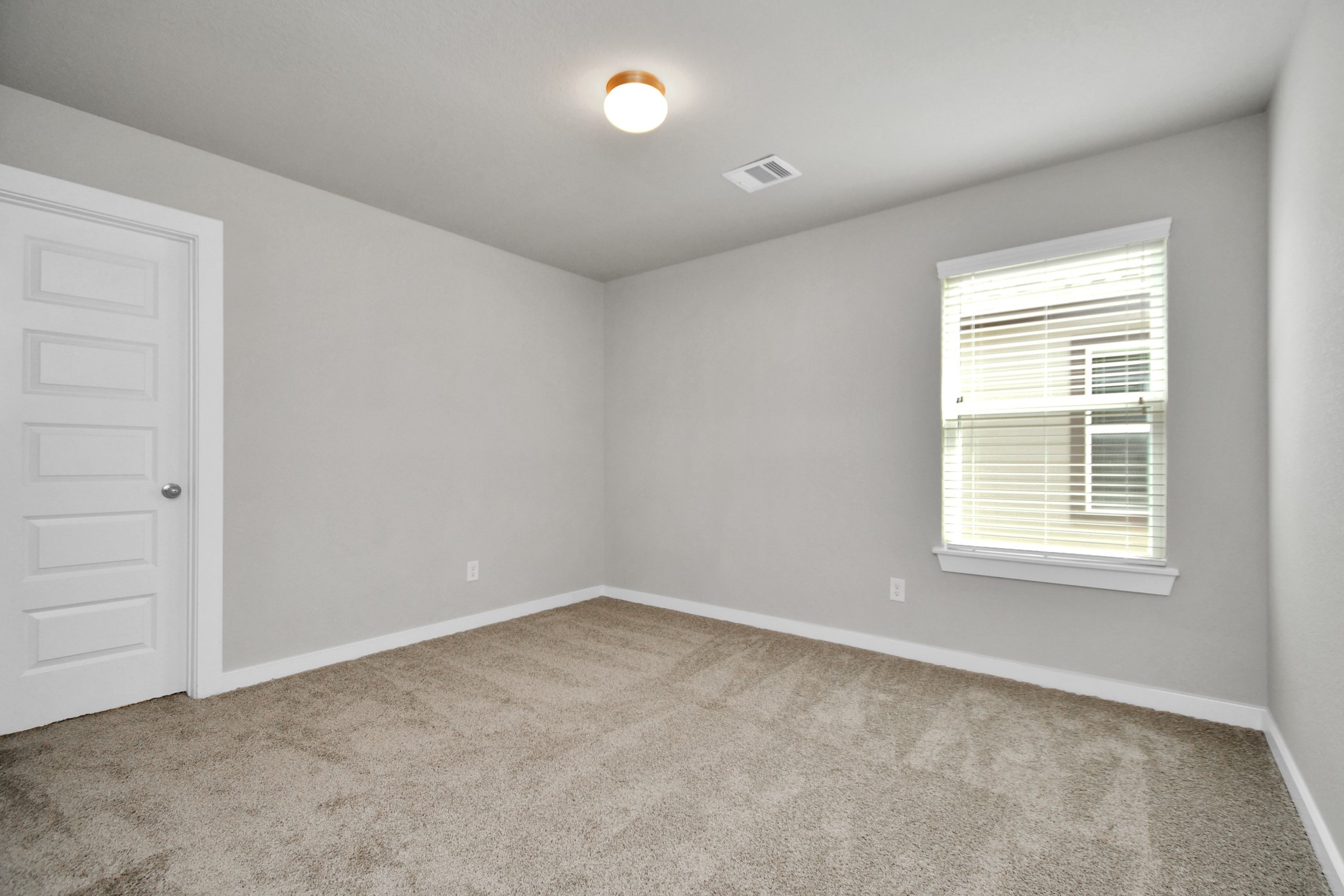 15111 Statice Trail Houston, TX 77044 - Photo 28 of 35 an empty room with a window