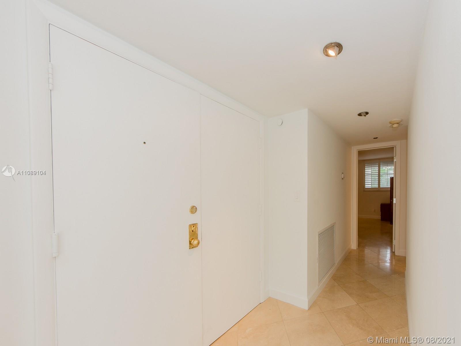 605 Ocean Drive, Unit 2L Key Biscayne, FL 33149 - Photo 14 of 18 a view of cupboard
