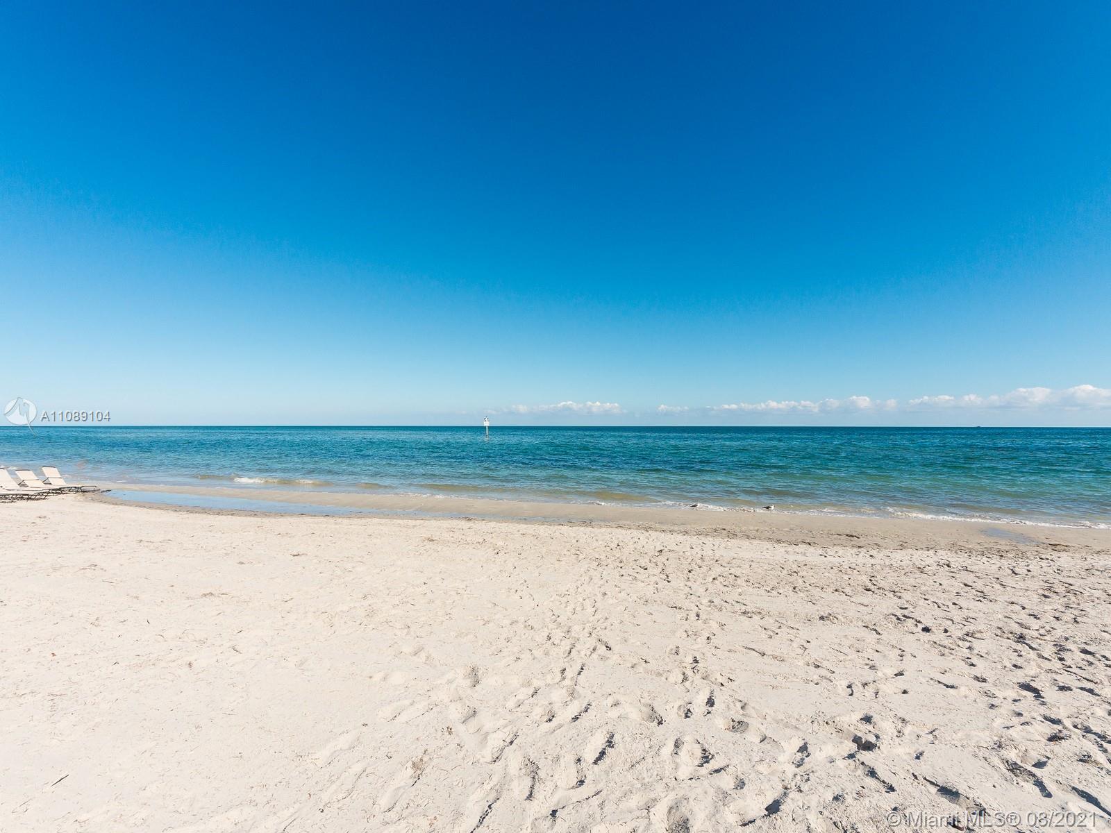 605 Ocean Drive, Unit 2L Key Biscayne, FL 33149 - Photo 18 of 18 a view of an ocean beach
