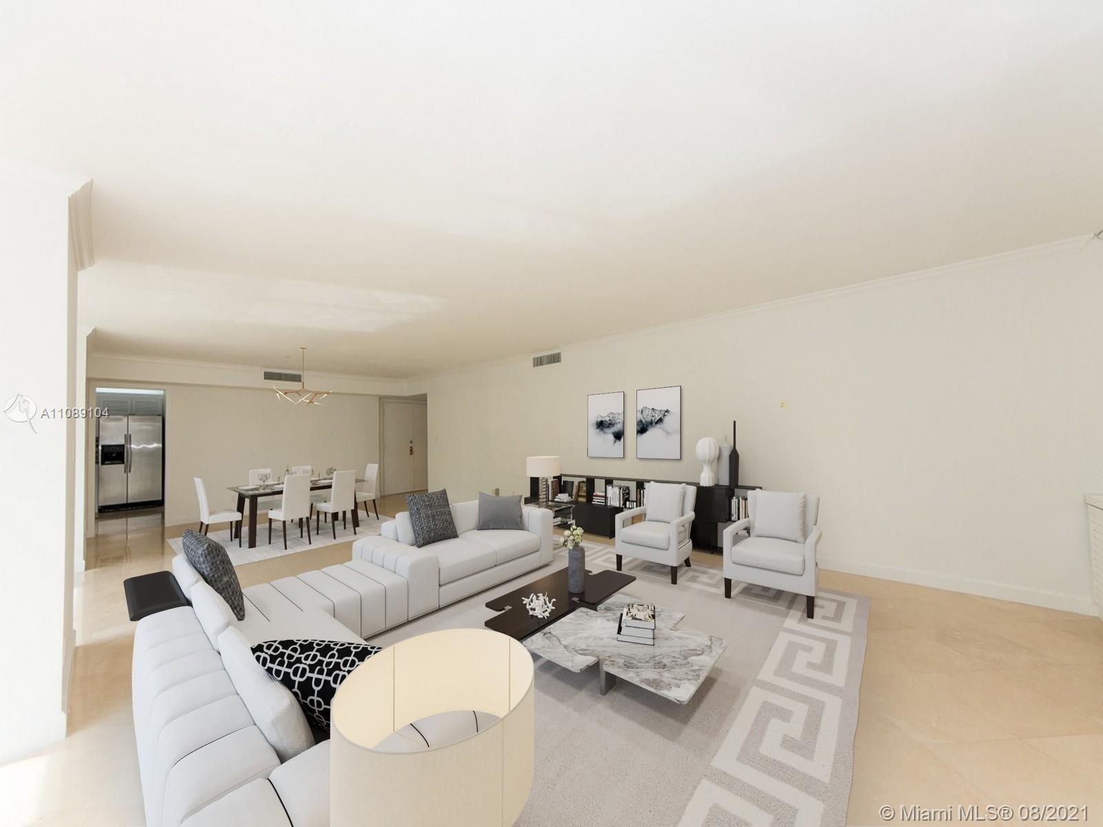 605 Ocean Drive, Unit 2L Key Biscayne, FL 33149 - Photo 3 of 18 a living room with furniture and next to a window