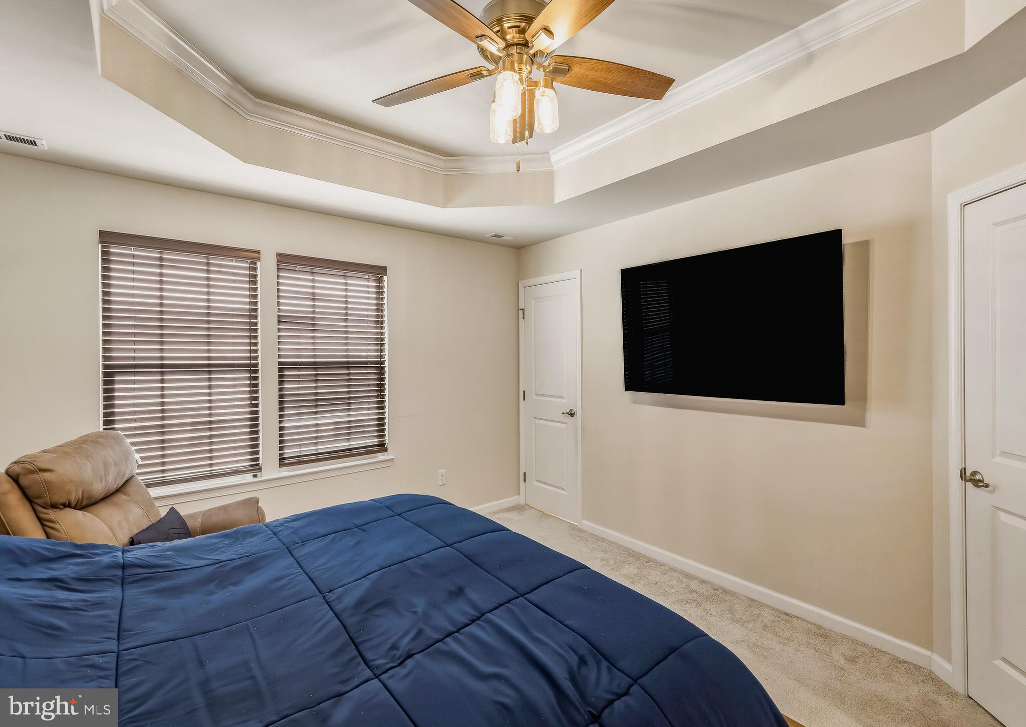36 Continental Boulevard Sicklerville, NJ 08081 - Photo 25 of 25 a bedroom with a bed and a flat screen tv