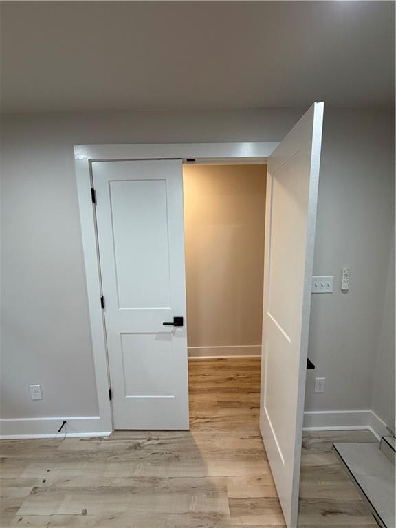 3119 Bellgreen Way Decatur, GA 30032 - Photo 11 of 13 an empty room with wooden floor